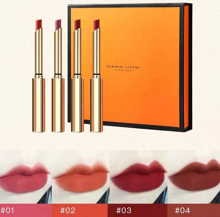 A gift box with 4 different colors pen lipstick