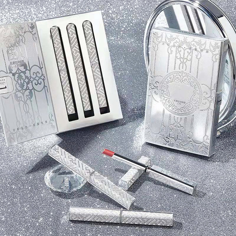 a gift box with 3 different colors lipstick